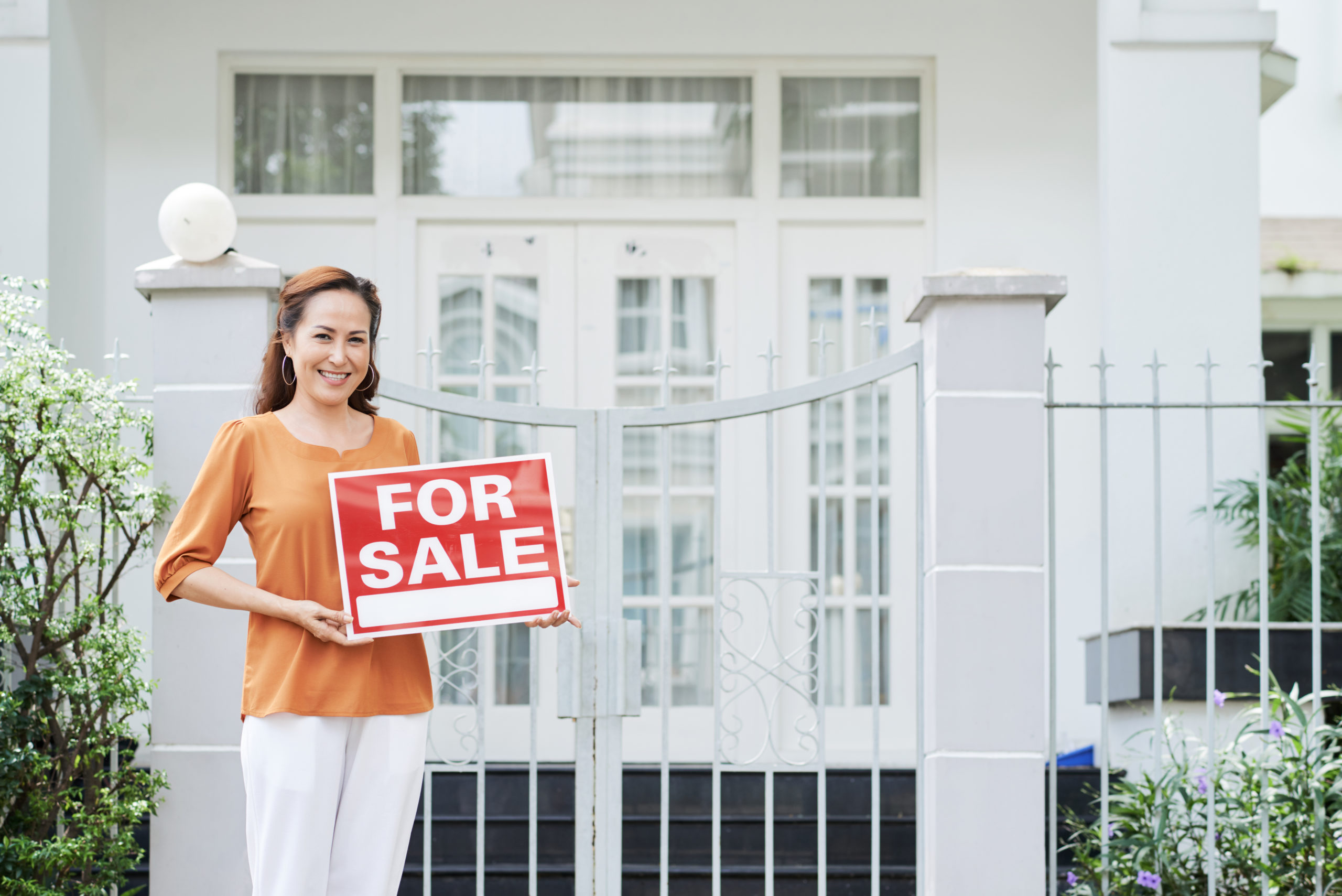 Woman Selling Her House